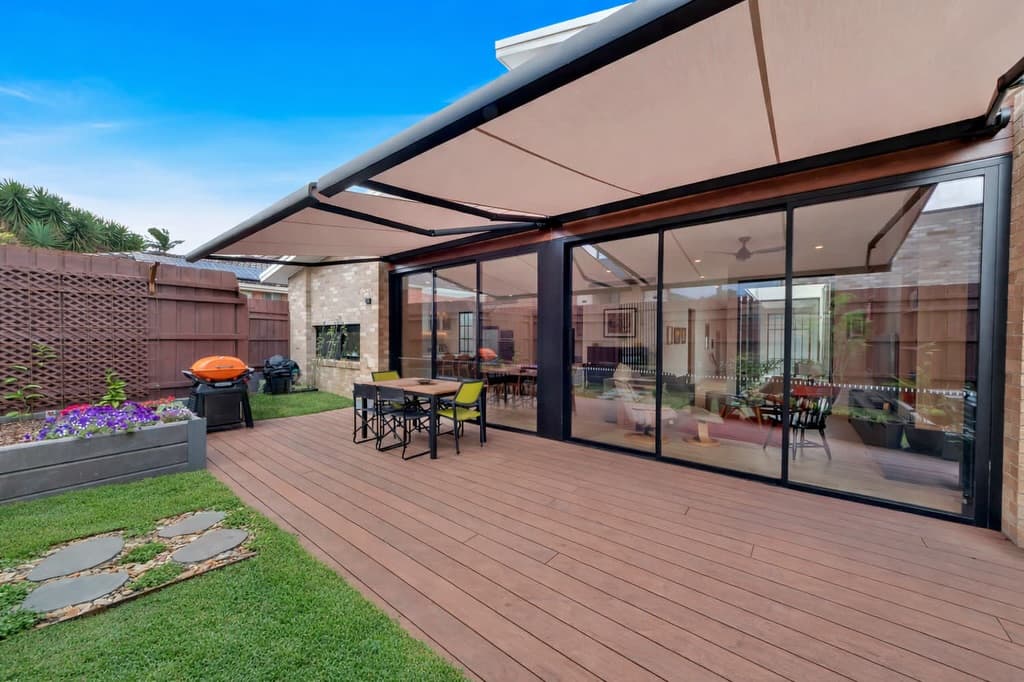 Hardwood decking and pergola structure